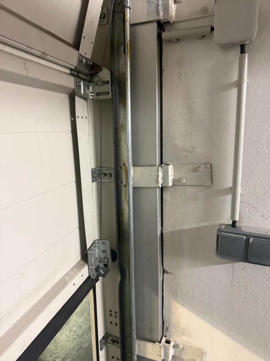 Rénovation porte de garage sectionnelle